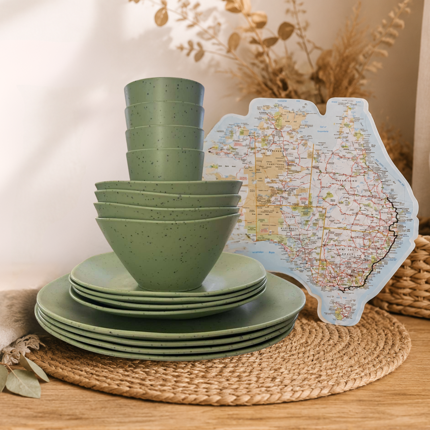 Vanaway Speckled Matcha recycled plastic camping dinnerware bundle with an Australian  travel map sticker, styled on a woven placemat for caravan and camping adventures.