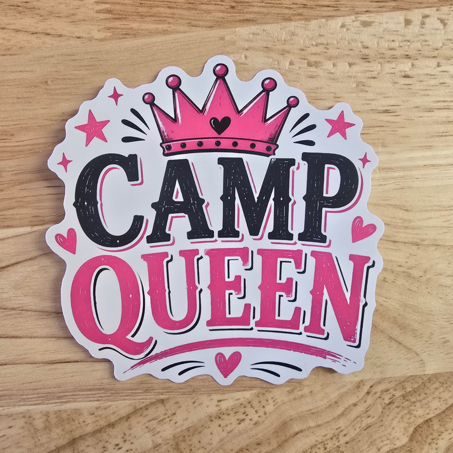 Vanaway Camp Queen waterproof vinyl sticker featuring a pink crown, bold black and pink lettering, stars and hearts on a white die-cut background