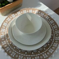 Vanaway Speckled Coconut rPET caravan dinnerware place setting featuring a dinner plate, side plate and bowl stacked together, showcasing the soft white speckled finish and lightweight nesting design. asymmetrical dinnerware