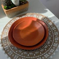 Vanaway Speckled Spice rPET caravan dinner plate and side plate stacked together, showcasing the warm terracotta speckled finish and lightweight design. asymmetrical dinnerware