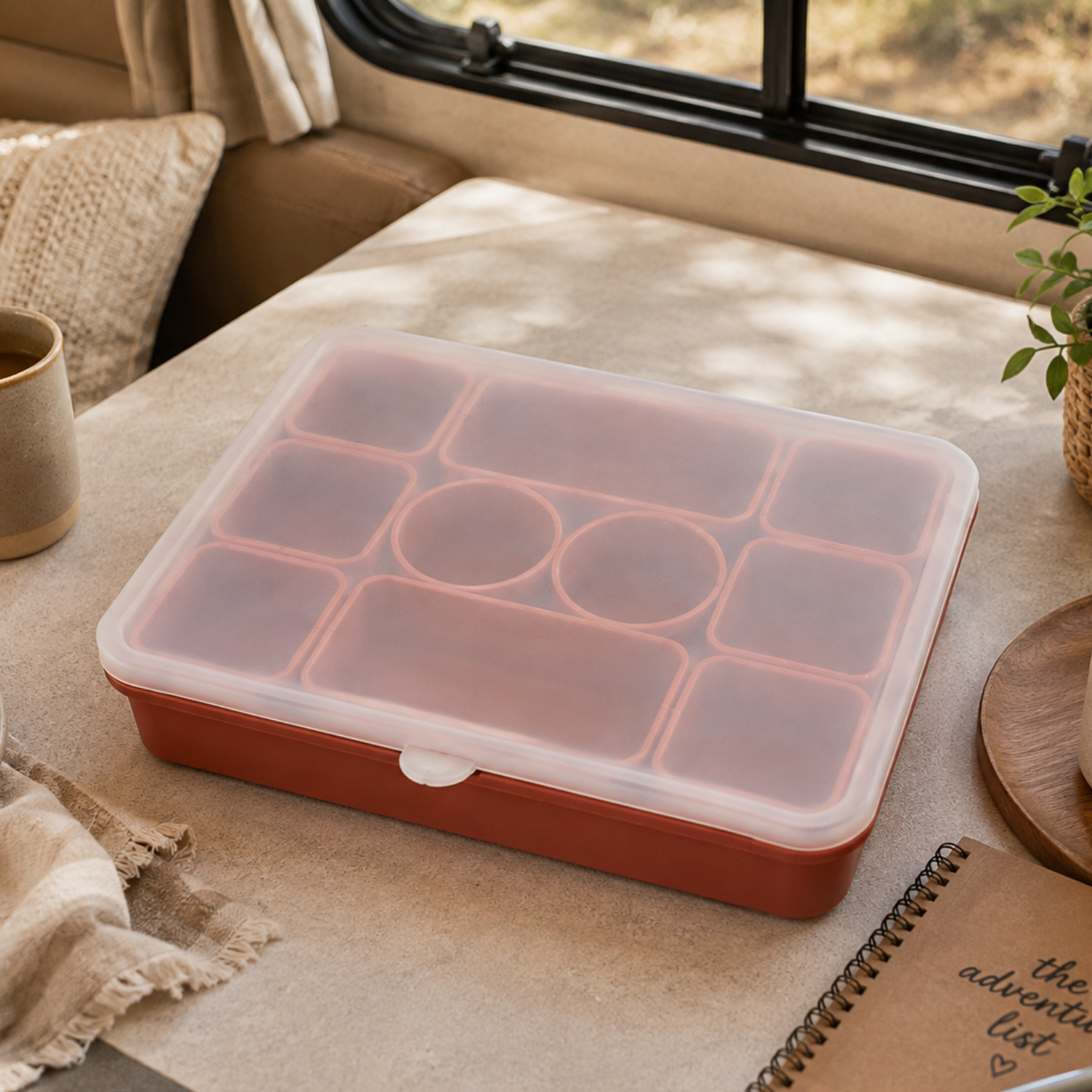 Vanaway Family Road Snack Box with the translucent lid closed on a caravan table, ready for travel.